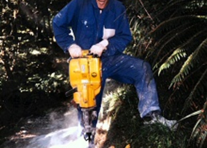 Geoff on rock drill, Certificate of Conservation work experience, Routeburn Track