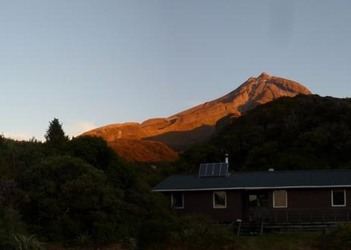 Holly Hut with Mount Taranaki