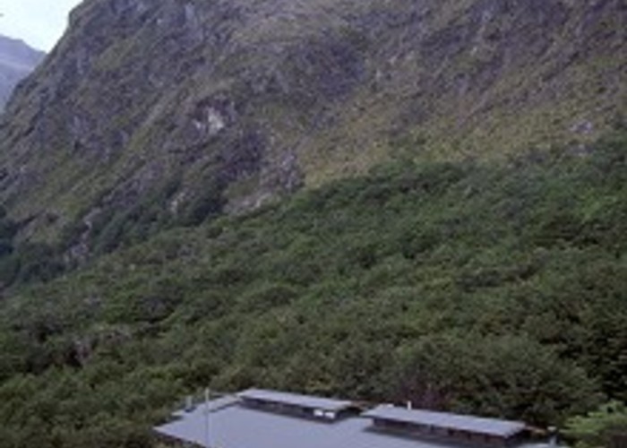Completed in December 1996, the Falls Hut sits lightly on the rugged landscape.