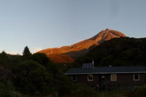 Holly Hut with Mount Taranaki