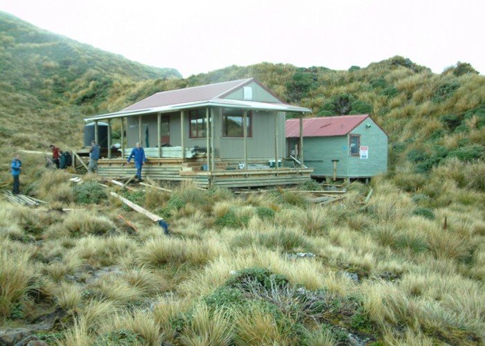 New and old Maungahuka Huts (old hut removed)