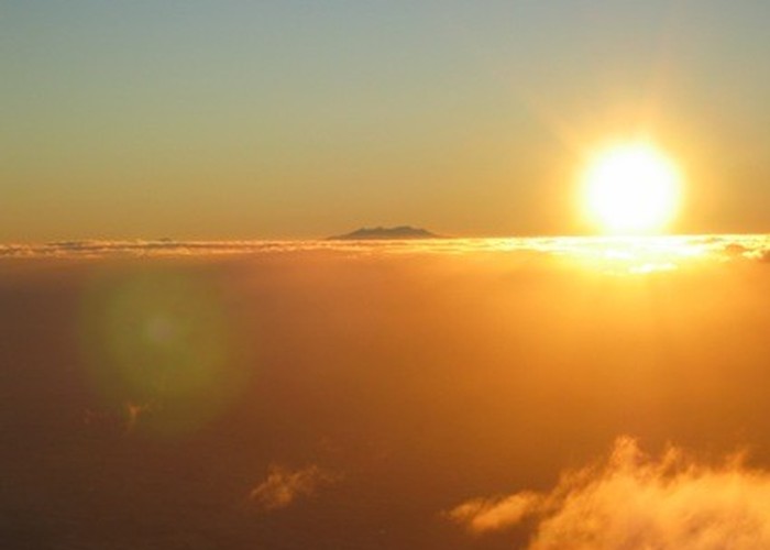 Mt Ruapehu at sunrise while ascending Mt Taranaki