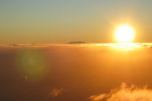 Mt Ruapehu at sunrise while ascending Mt Taranaki